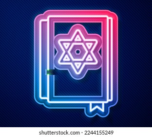 Glowing neon line Jewish torah book icon isolated on blue background. Pentateuch of Moses. On the cover of the Bible is the image of the Star of David.  Vector