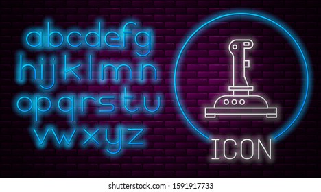 Glowing neon line Joystick for arcade machine icon isolated on brick wall background. Joystick gamepad. Neon light alphabet. Vector Illustration