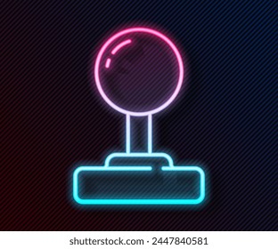 Glowing neon line Joystick for arcade machine icon isolated on black background. Joystick gamepad.  Vector