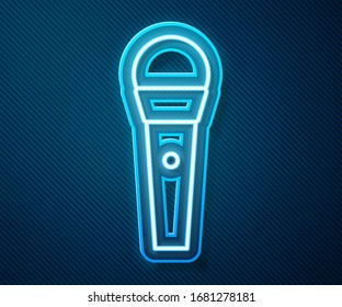 Glowing neon line Karaoke icon isolated on blue background. Microphone and monitor.  Vector Illustration