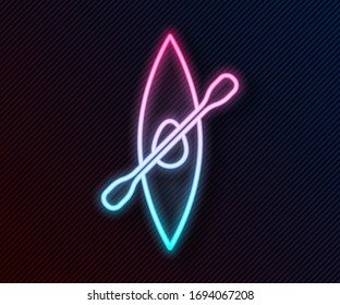 Glowing neon line Kayak and paddle icon isolated on black background. Kayak and canoe for fishing and tourism. Outdoor activities.  Vector Illustration