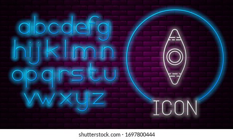 Glowing neon line Kayak and paddle icon isolated on brick wall background. Kayak and canoe for fishing and tourism. Outdoor activities. Neon light alphabet. Vector Illustration