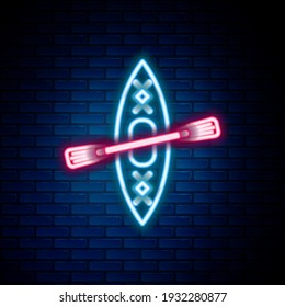 Glowing neon line Kayak and paddle icon isolated on brick wall background. Kayak and canoe for fishing and tourism. Outdoor activities. Colorful outline concept. Vector