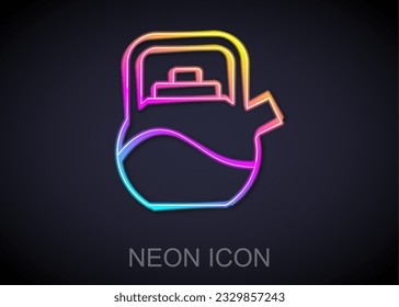 Glowing neon line Kettle with handle icon isolated on black background. Teapot icon.  Vector