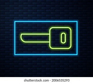 Glowing neon line Key icon isolated on brick wall background.  Vector Illustration