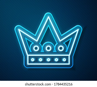 Glowing neon line King playing card icon isolated on blue background. Casino gambling.  Vector Illustration