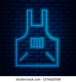 Glowing neon line Kitchen apron icon isolated on brick wall background. Chef uniform for cooking.  Vector Illustration