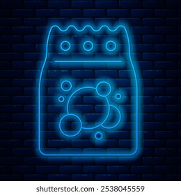 Glowing neon line Laundry detergent for automatic wash machine icon isolated on brick wall background.  Vector