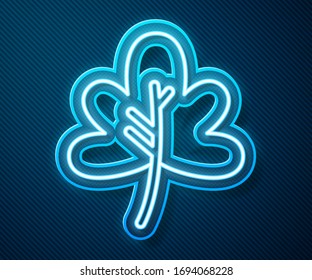 Glowing neon line Leaf icon isolated on blue background. Leaves sign. Fresh natural product symbol.  Vector Illustration