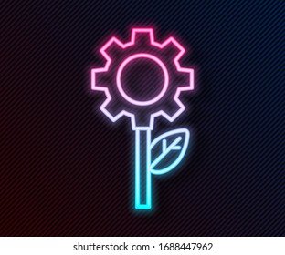 Glowing neon line Leaf plant ecology in gear machine icon isolated on black background. Eco friendly technology. World Environment day label.  Vector Illustration