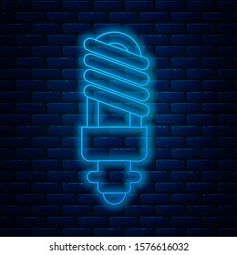 Glowing neon line LED light bulb icon isolated on brick wall background. Economical LED illuminated lightbulb. Save energy lamp.  Vector Illustration