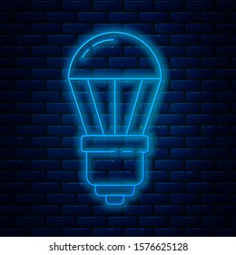Glowing neon line LED light bulb icon isolated on brick wall background. Economical LED illuminated lightbulb. Save energy lamp.  Vector Illustration