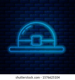 Glowing neon line Leprechaun hat icon isolated on brick wall background. Happy Saint Patricks day.  Vector Illustration