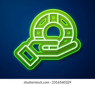 Glowing neon line Lifebuoy in hand icon isolated on blue background. Lifebelt symbol.  Vector