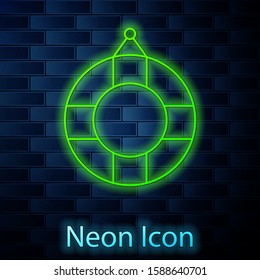 Glowing neon line Lifebuoy icon isolated on brick wall background. Lifebelt symbol.  Vector Illustration