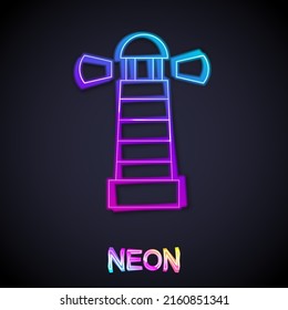 Glowing neon line Lighthouse icon isolated on black background.  Vector