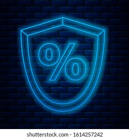 Glowing neon line Loan percent icon isolated on brick wall background. Protection shield sign. Credit percentage symbol.  Vector Illustration
