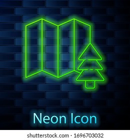 Glowing neon line Location of the forest on a map icon isolated on brick wall background. Vector Illustration