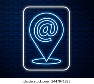 Glowing neon line Location and mail and e-mail icon isolated on brick wall background. Envelope symbol e-mail. Email message sign.  Vector Illustration