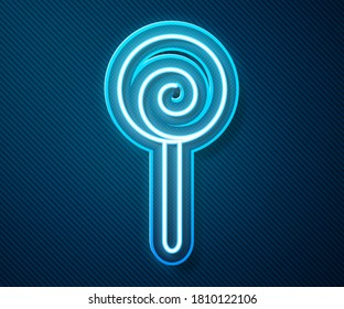 Glowing neon line Lollipop icon isolated on blue background. Food, delicious symbol.  Vector Illustration