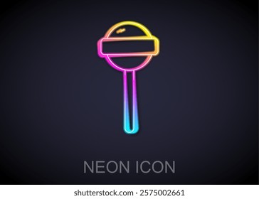 Glowing neon line Lollipop icon isolated on black background. Food, delicious symbol.  Vector