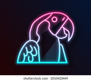 Glowing neon line Macaw parrot bird animal icon isolated on black background. Animal symbol.  Vector