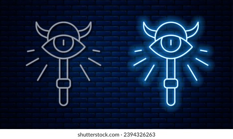 Glowing neon line Magic staff icon isolated on brick wall background. Magic wand, scepter, stick, rod.  Vector