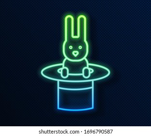 Glowing neon line Magician hat and rabbit icon isolated on blue background. Magic trick. Mystery entertainment concept.  Vector Illustration