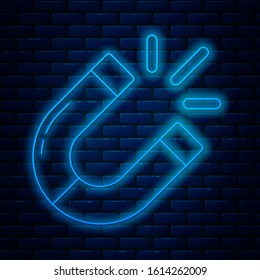 Glowing neon line Magnet icon isolated on brick wall background. Horseshoe magnet, magnetism, magnetize, attraction.  Vector Illustration