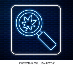 Glowing neon line Magnifying glass with leaf icon isolated on brick wall background. Scientific biology, study nature leaf.  Vector Illustration
