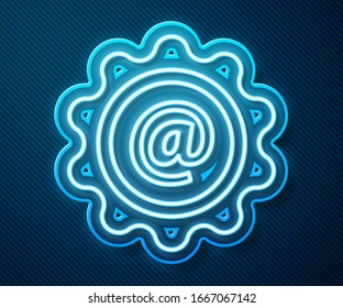 Glowing neon line Mail and e-mail icon isolated on blue background. Envelope symbol e-mail. Email message sign.  Vector Illustration
