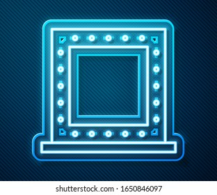 Glowing neon line Makeup mirror with lights icon isolated on blue background.  Vector Illustration