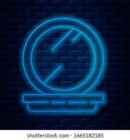 Glowing neon line Makeup powder with mirror icon isolated on brick wall background. 8 March. International Happy Women Day.  Vector Illustration