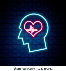 Glowing neon line Male head with a heartbeat icon isolated on brick wall background. Head with mental health, healthcare and medical sign. Colorful outline concept. Vector