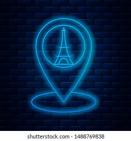 Glowing neon line Map pointer with Eiffel tower icon isolated on brick wall background. France Paris landmark symbol.  Vector Illustration