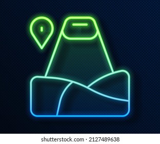 Glowing neon line Map pointer with mountain icon isolated on blue background. Mountains travel icon.  Vector