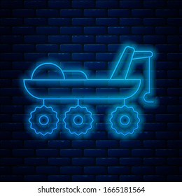 Glowing neon line Mars rover icon isolated on brick wall background. Space rover. Moonwalker sign. Apparatus for studying planets surface.  Vector Illustration
