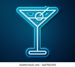 Glowing neon line Martini glass icon isolated on blue background. Cocktail icon. Wine glass icon.  Vector Illustration