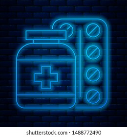 Glowing neon line Medicine bottle and pills icon isolated on brick wall background. Bottle pill sign. Pharmacy design.  Vector Illustration