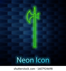 Glowing neon line Medieval halberd icon isolated on brick wall background. Medieval weapon.  Vector Illustration