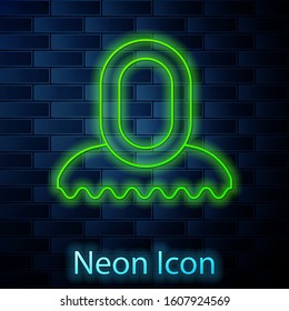 Glowing neon line Medieval hood icon isolated on brick wall background. Hooded sweatshirt.  Vector Illustration