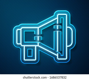 Glowing neon line Megaphone icon isolated on blue background. Loud speach alert concept. Bullhorn for Mouthpiece scream promotion.  Vector Illustration