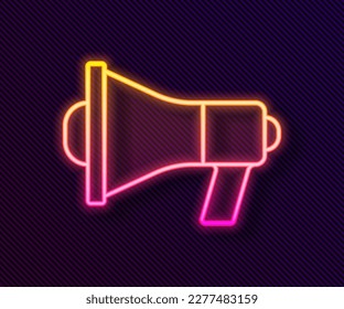 Glowing neon line Megaphone icon isolated on black background. Speaker sign.  Vector