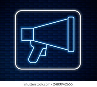 Glowing neon line Megaphone icon isolated on brick wall background. Speaker sign.  Vector
