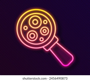 Glowing neon line Microorganisms under magnifier icon isolated on black background. Bacteria and germs, cell cancer, microbe, virus, fungi.  Vector