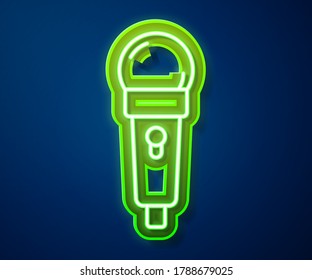 Glowing neon line Microphone icon isolated on blue background. On air radio mic microphone. Speaker sign.  Vector