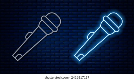 Glowing neon line Microphone icon isolated on brick wall background. On air radio mic microphone. Speaker sign.  Vector