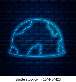 Glowing neon line Military helmet icon isolated on brick wall background. Army hat symbol of defense and protect. Protective hat.  Vector Illustration