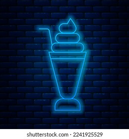 Glowing neon line Milkshake icon isolated on brick wall background. Plastic cup with lid and straw.  Vector