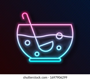 Glowing neon line Mixed punch with fresh fruits in bowl icon isolated on black background.  Vector Illustration